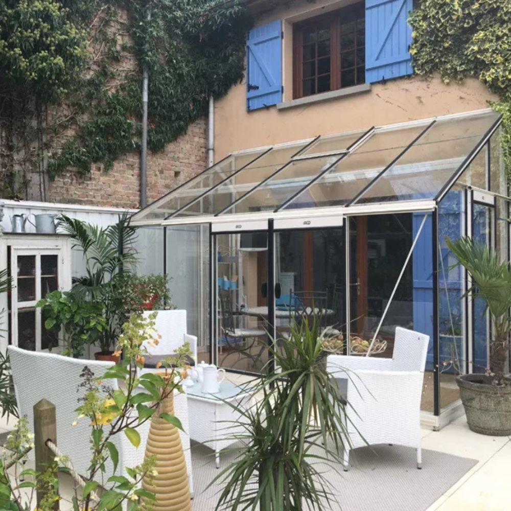 Serre adossée en verre MS304 de la marque ACD - 9 m2 - parois obliques