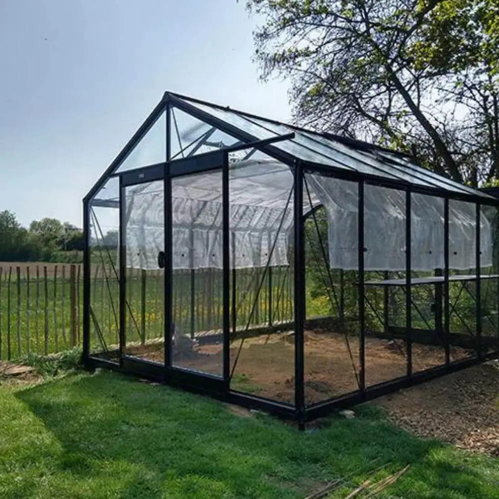 Serre de jardin en verre securit 11m² ACD avec un jardin en fond